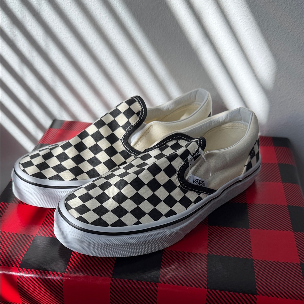 Vans Black and White Checkerboard Slip-Ons